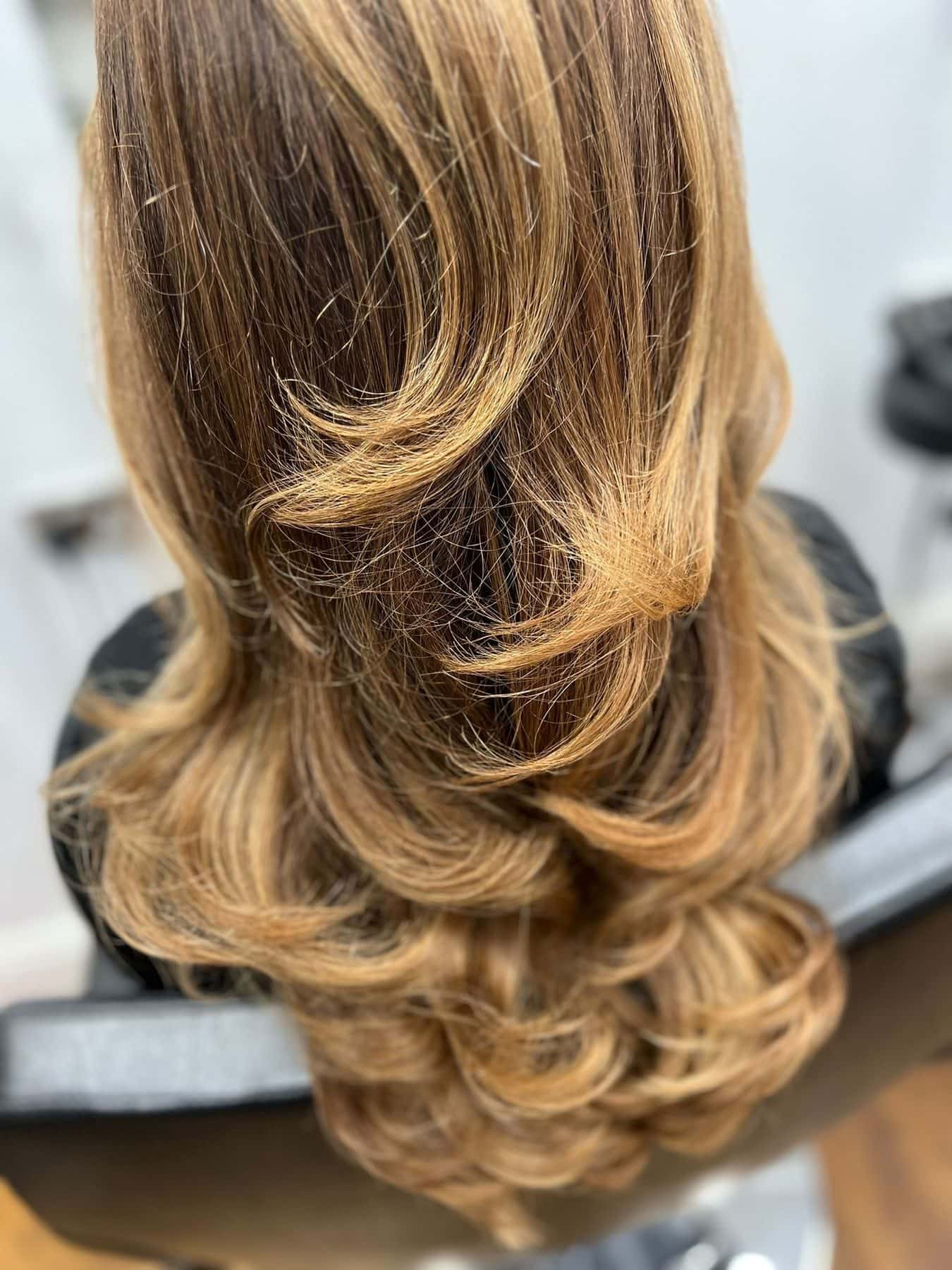 Bouncy blowout curls, overhead view, at The Establishment Hairdressing, Farnham