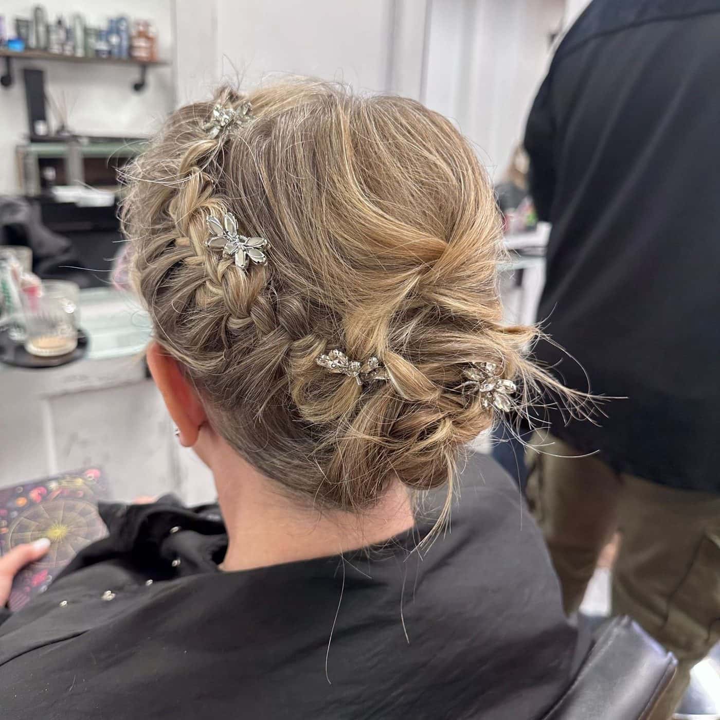 Bridal braided updo finished with jewelled hair pins at The Establishment Hairdressing, Farnham