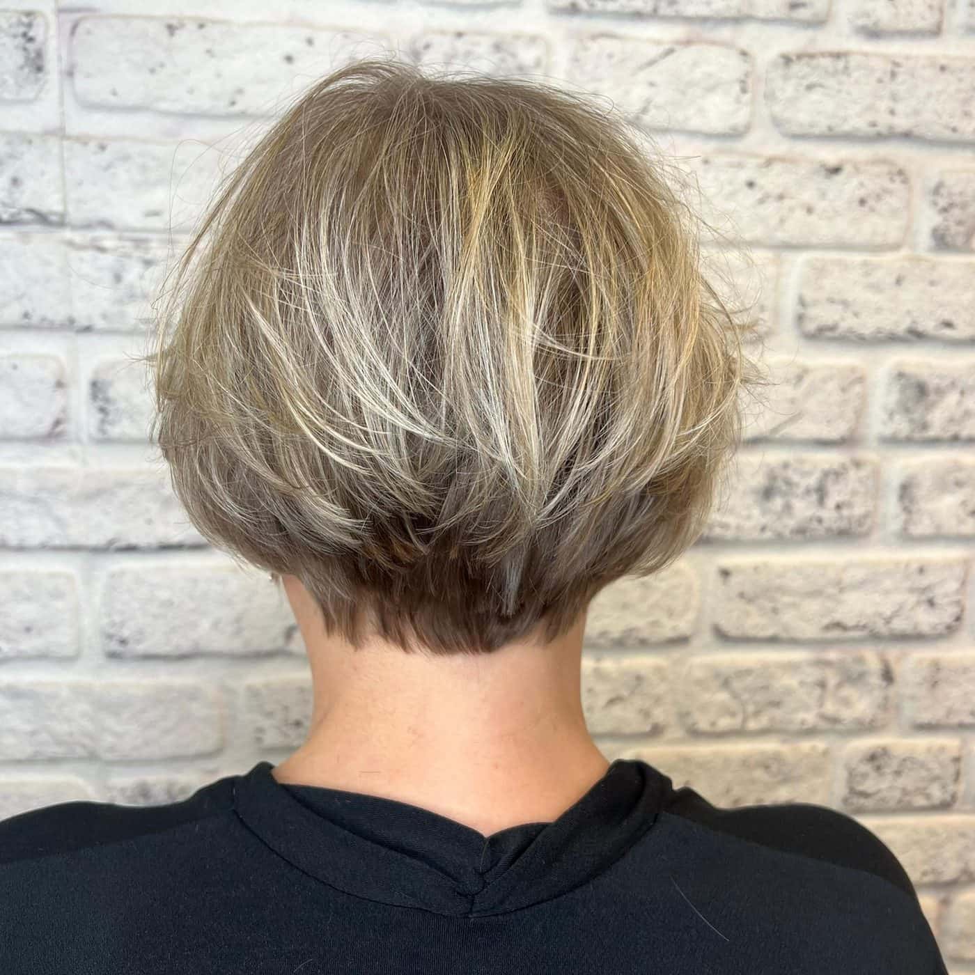 Graduated blonde bob, back view, at The Establishment Hairdressing, Farnham