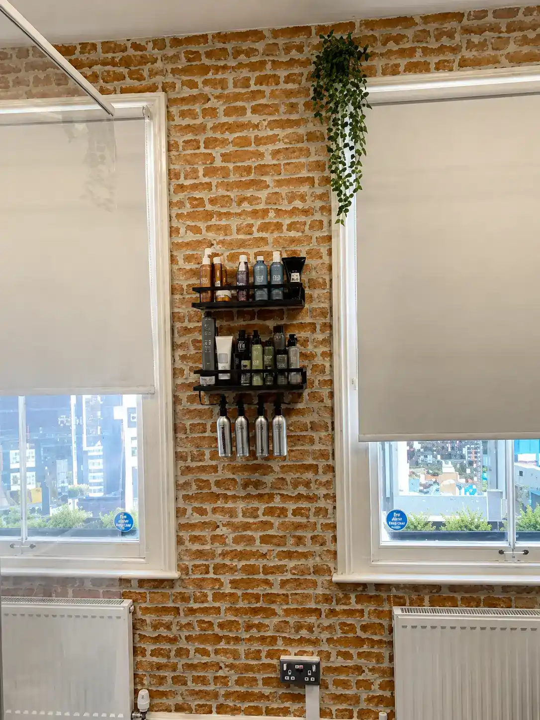 Colour room with Goldwell product shelves at The Establishment Hairdressing, Farnham