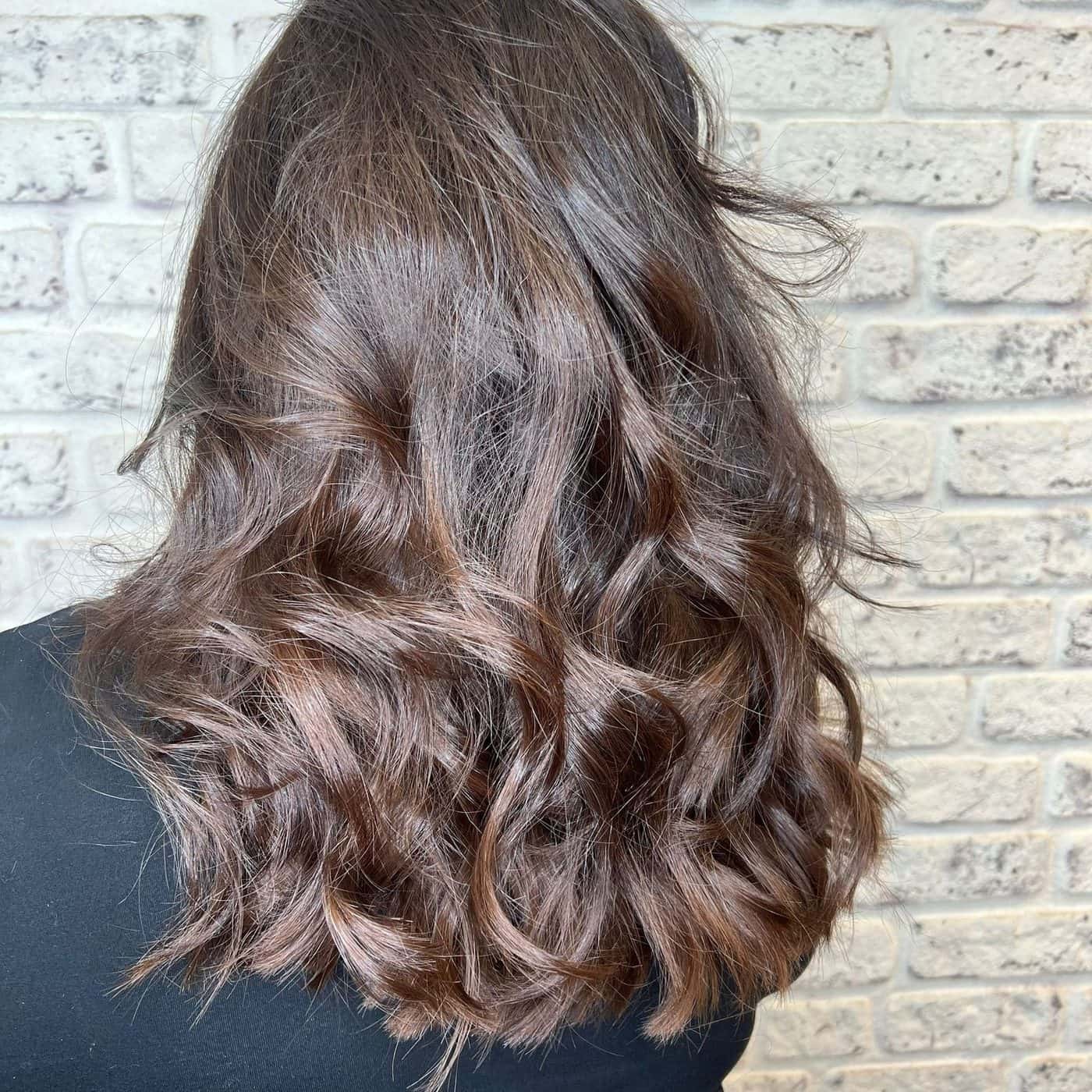 Warm brunette balayage finished with a blowout at The Establishment Hairdressing, Farnham